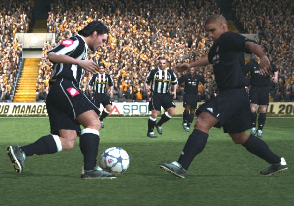 A defender moves in